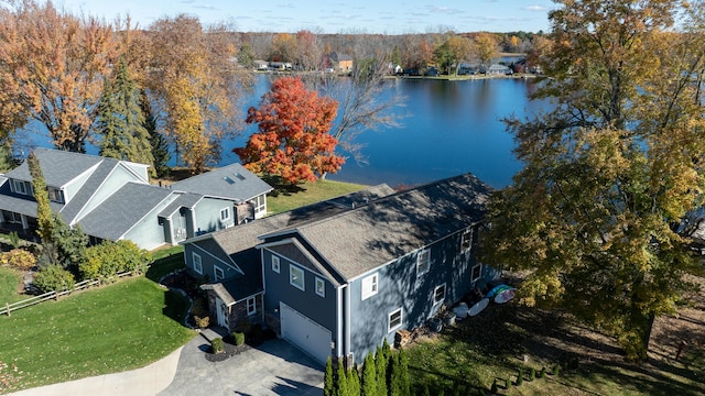 bird's eye view with a water view