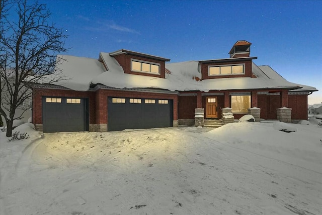 prairie-style home with a garage