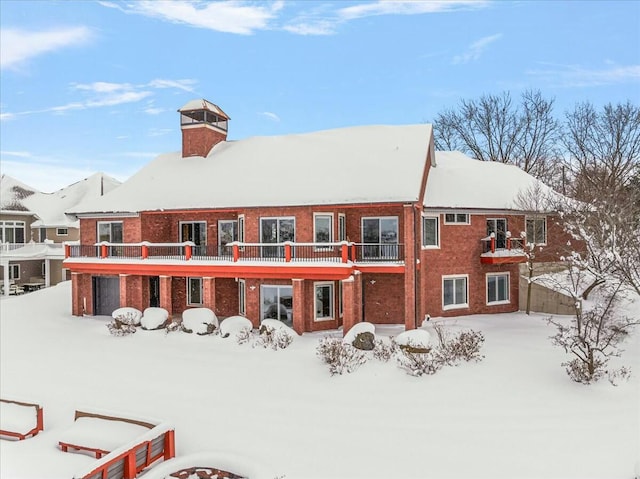 view of snow covered property