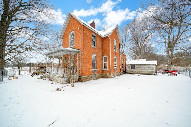 view of snow covered property