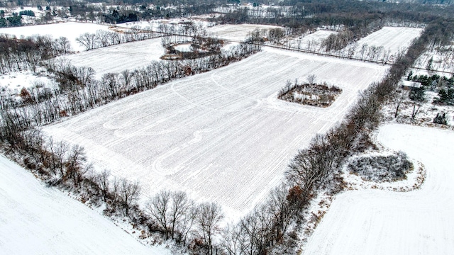 snowy aerial view with a rural view