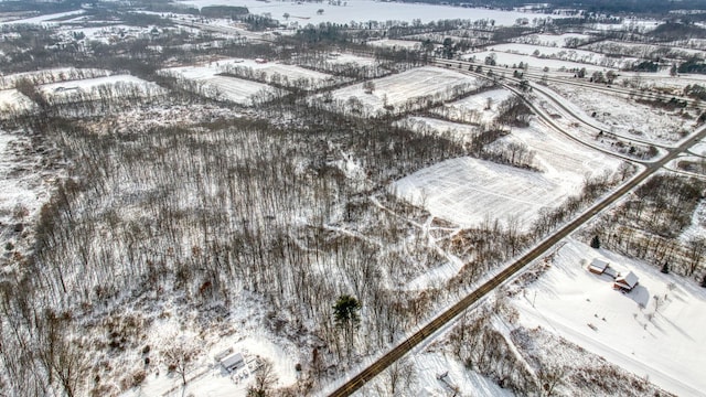 snowy aerial view with a rural view