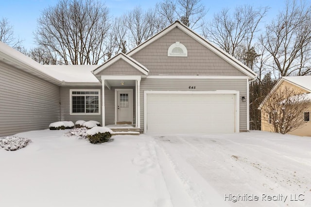 view of front of property featuring a garage