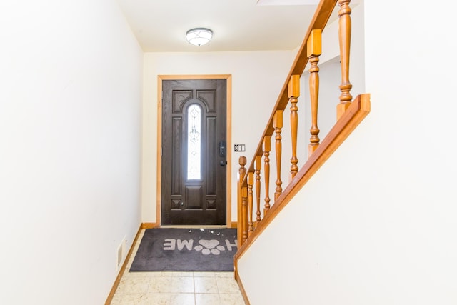 view of tiled foyer entrance