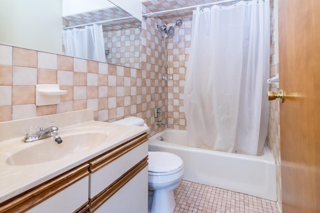 full bathroom featuring toilet, shower / tub combo, tile walls, vanity, and backsplash