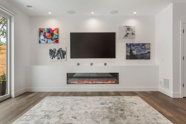 living room featuring dark hardwood / wood-style floors