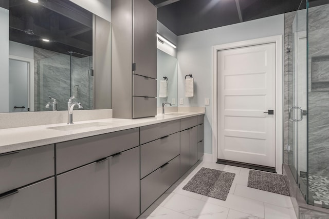 bathroom with vanity and an enclosed shower