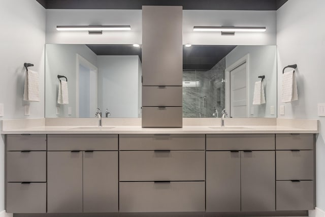 bathroom featuring vanity and a shower with door