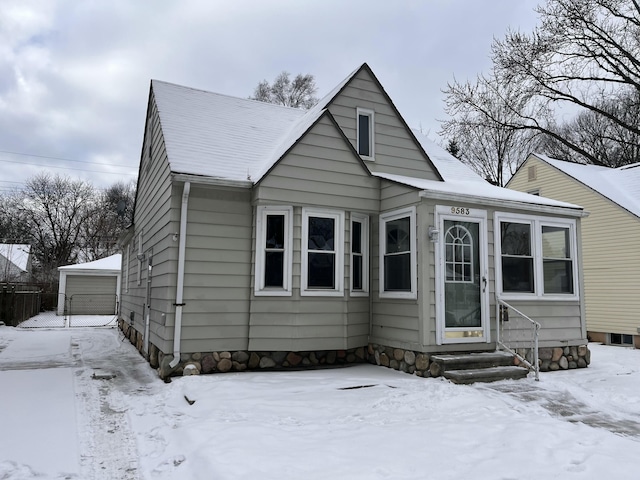 bungalow-style house featuring a garage