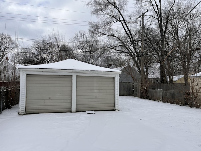 view of snow covered garage