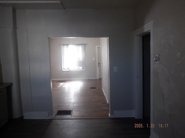 hall featuring dark hardwood / wood-style flooring