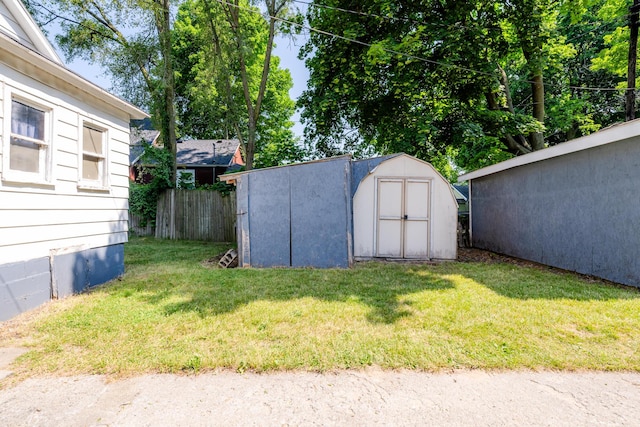 view of outdoor structure with a lawn