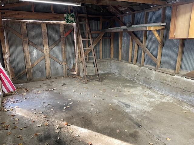 miscellaneous room with concrete flooring