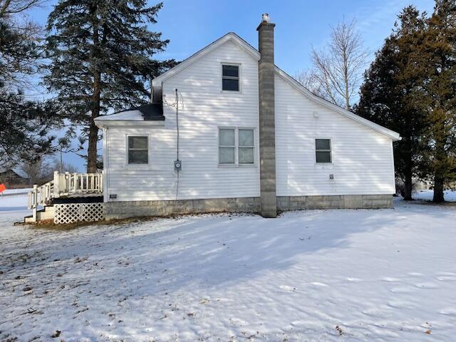 view of snow covered property