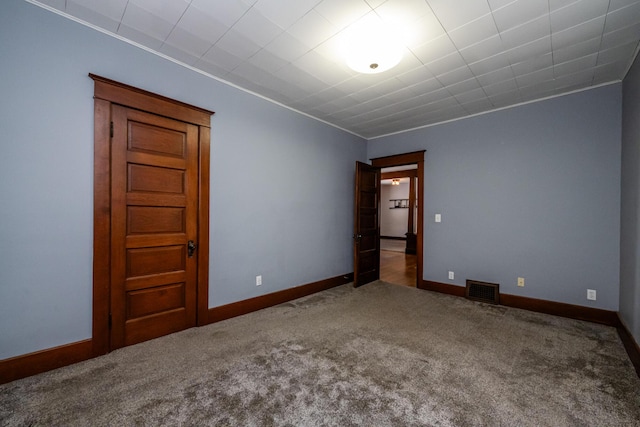 empty room featuring carpet floors