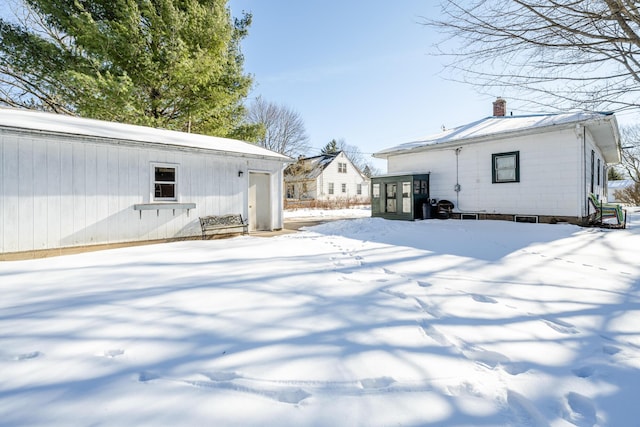 view of yard covered in snow