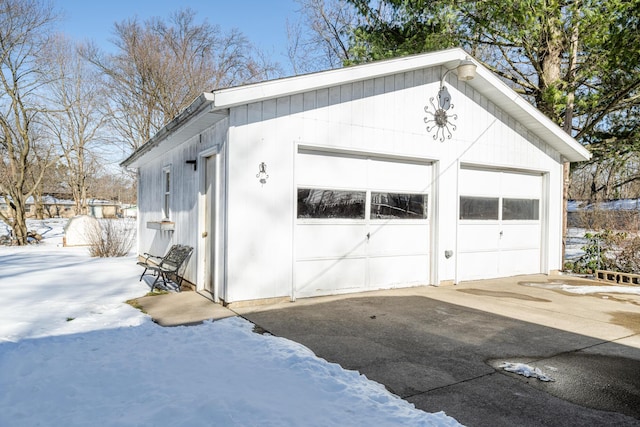 view of snow covered garage