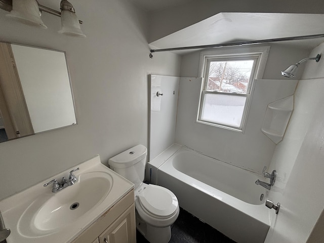 full bathroom featuring vanity, shower / washtub combination, and toilet