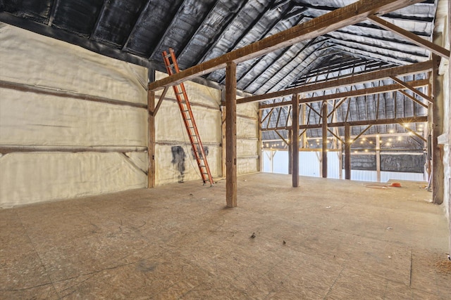 interior space featuring vaulted ceiling