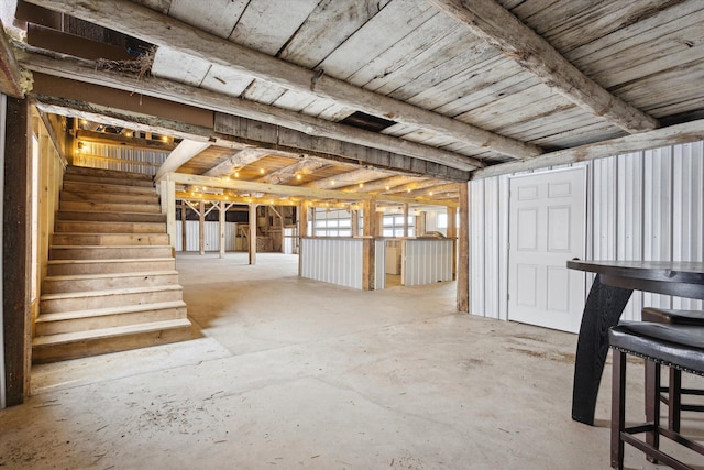 basement featuring wooden ceiling