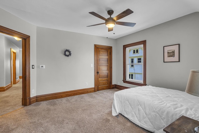 bedroom with light colored carpet and ceiling fan