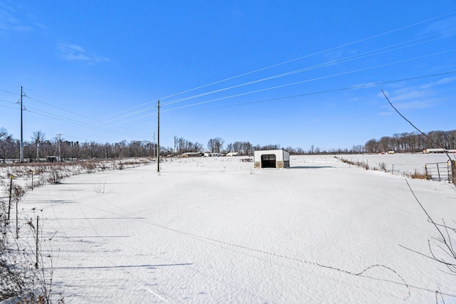 view of yard covered in snow