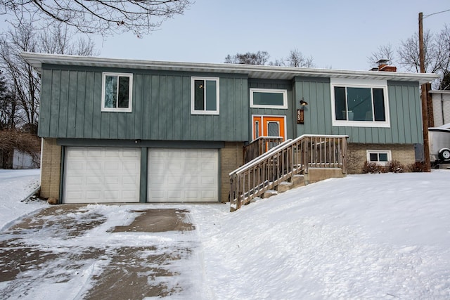 bi-level home featuring a garage