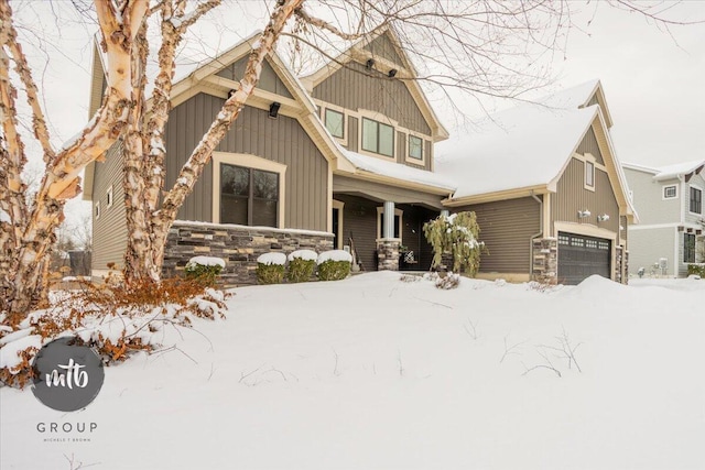 craftsman inspired home with a garage