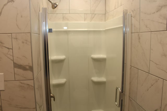 bathroom with an enclosed shower