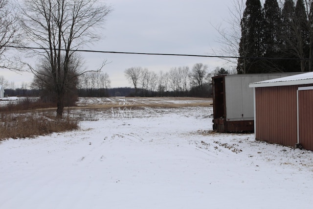 view of yard covered in snow