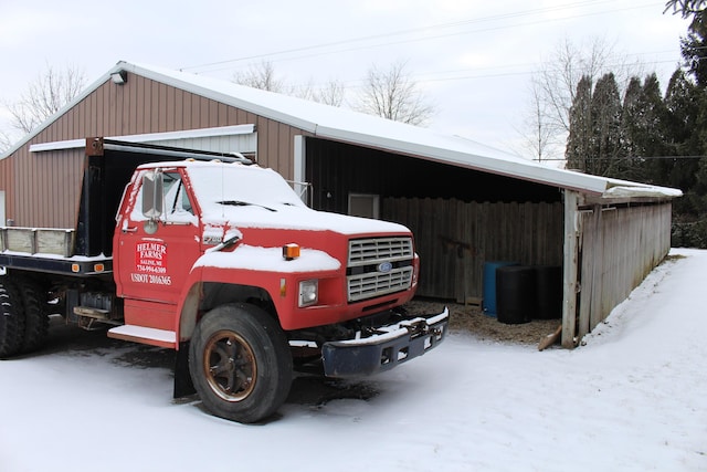 view of snow covered garage