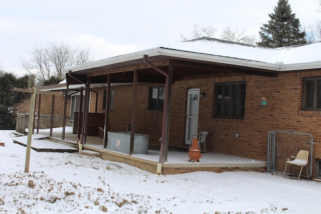 view of snow covered property