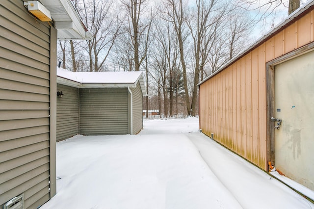 view of yard layered in snow