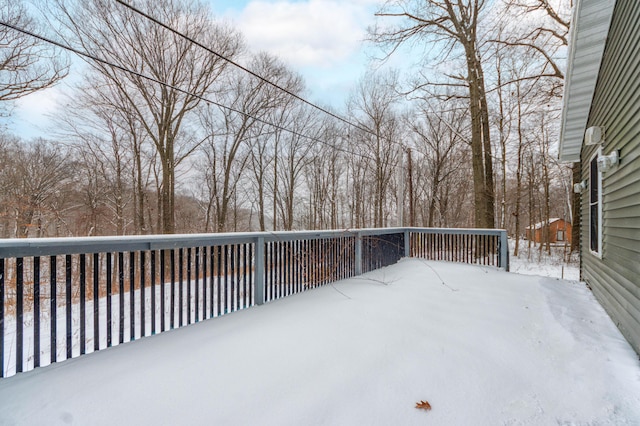 view of snow covered deck