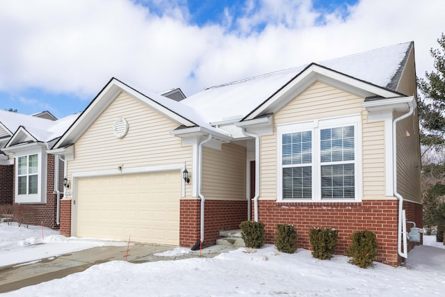 view of front of property with a garage