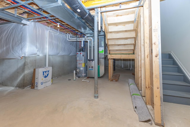 basement with gas water heater and heating unit