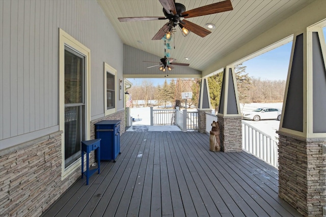 deck featuring a porch and ceiling fan