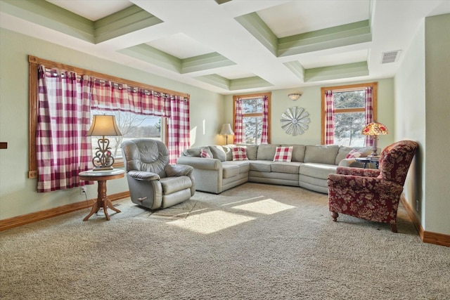 carpeted living room with coffered ceiling and beam ceiling