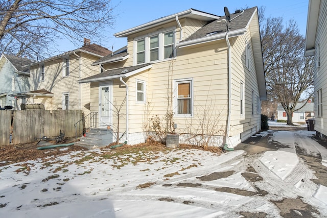 view of snow covered house