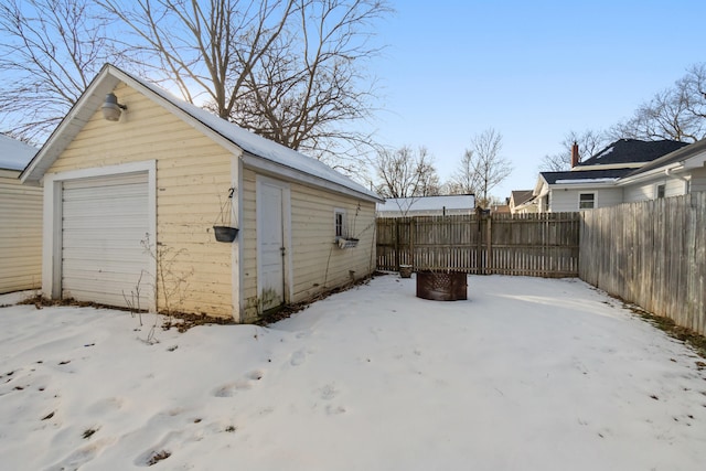 view of snow covered garage