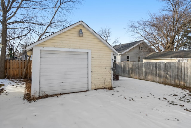 view of snow covered garage