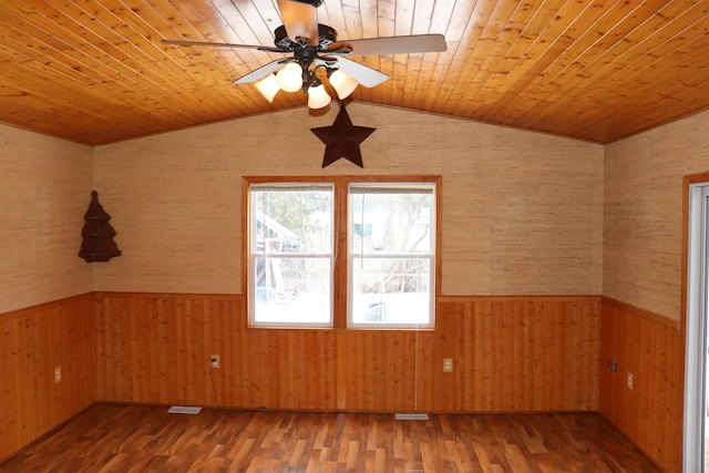 unfurnished room with hardwood / wood-style flooring, ceiling fan, lofted ceiling, and wooden ceiling