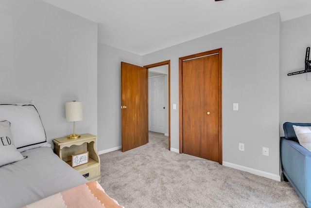 bedroom with light carpet