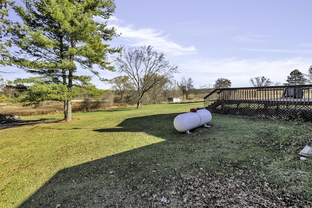 view of yard with a wooden deck