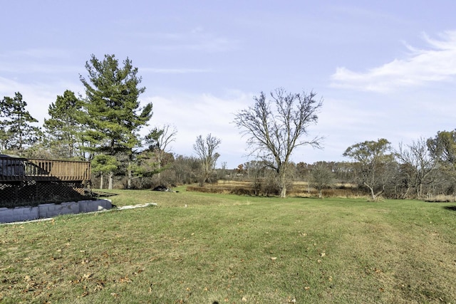 view of yard with a deck