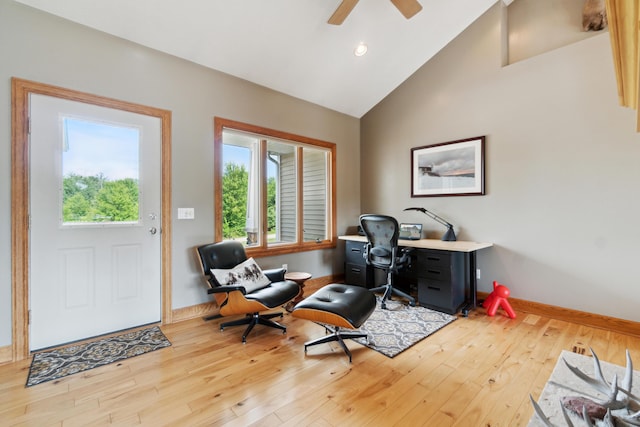 office space featuring lofted ceiling, light hardwood / wood-style floors, and ceiling fan