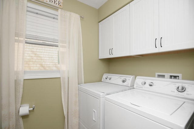 laundry area featuring washing machine and dryer