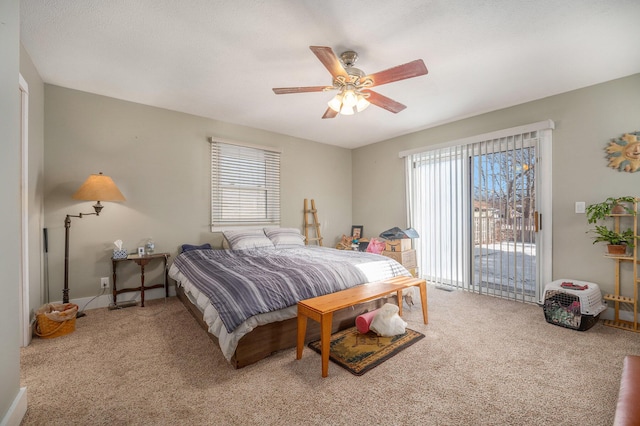 bedroom featuring access to exterior, carpet floors, and ceiling fan