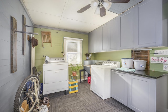 clothes washing area with cabinets, separate washer and dryer, sink, and ceiling fan