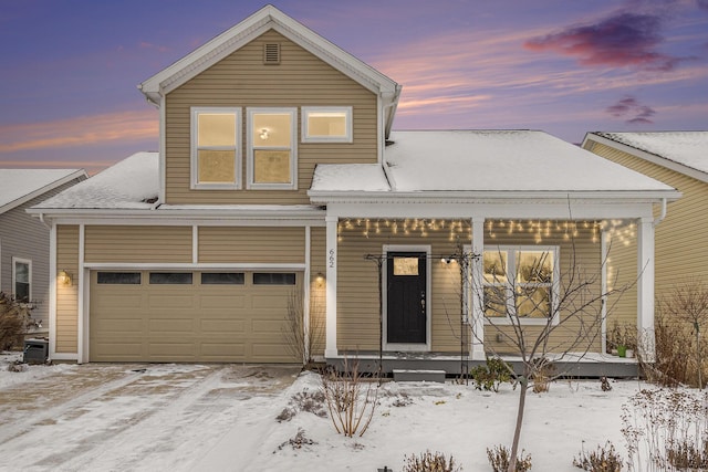 view of front of property featuring a garage